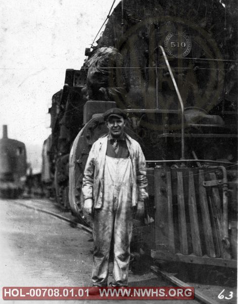 VGN Class AC #510 head on view with unidentified people, location/date unknown