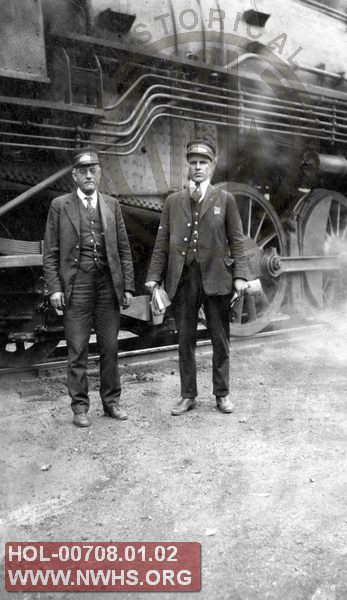 VGN locomotive with unidentified people, location/date unknown