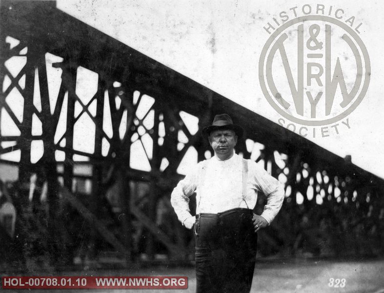 VGN unidentified man, location/date unknown, with trestle in background