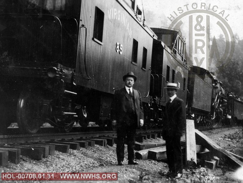 VGN unidentified men, location/date with caboose #85 & #78 in background