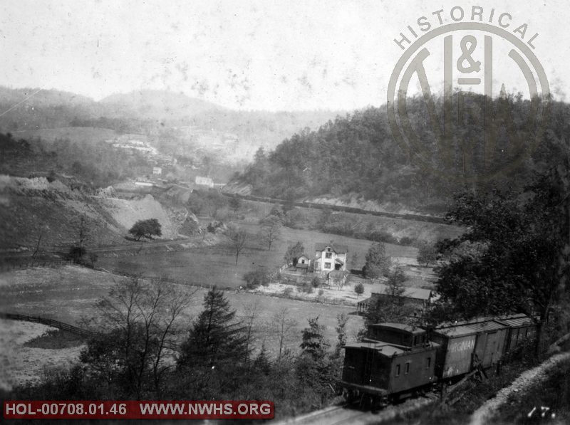 VGN view at Rock, with caboose of Eastbound train in foreground. date unknown