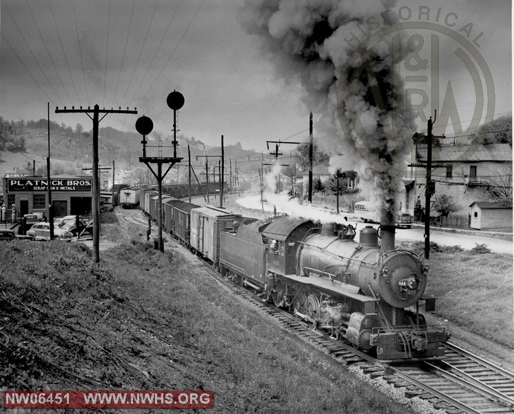 M # 468 Right Side 3/4 View EB at Bluefield, VA passing Platnick Brothers scrap yard at Furnace St. crossing