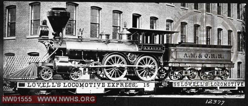 AM&O 4-4-0 #15, Left Side View on "Lovell's Locomotive Express" flat cars