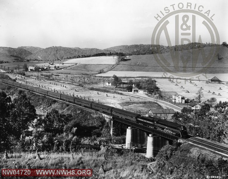 Class J,Right 5/8 Elevated View w/Passenger Trains,B&W