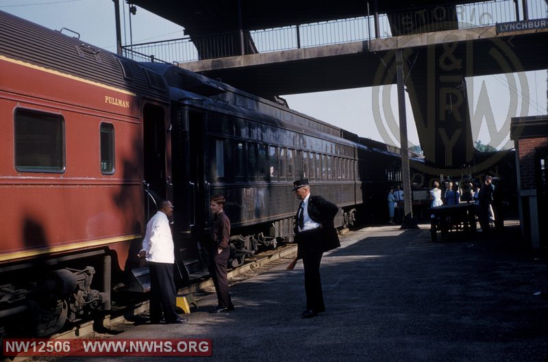 N&W Conductor & Passengers on platform at Kemper Street station at Lynchburg, VA