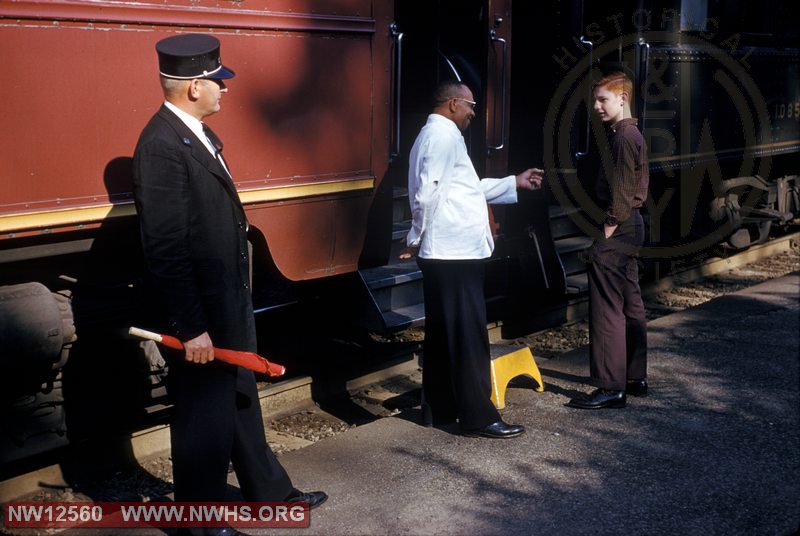 N&W Conductor & Passengers on platform at Kemper Street station at Lynchburg, VA