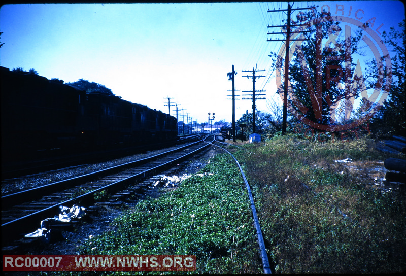 View of westbound train just east of Tinker Creek Crossing